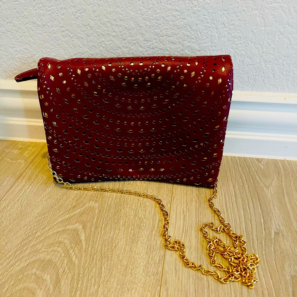 Maroon and gold clutch/crossbody with gold chain